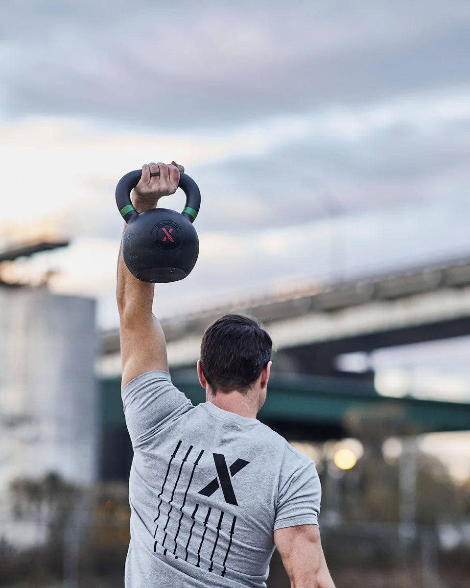 Premium Photo  Weightlifting fitness and people with kettle bell
